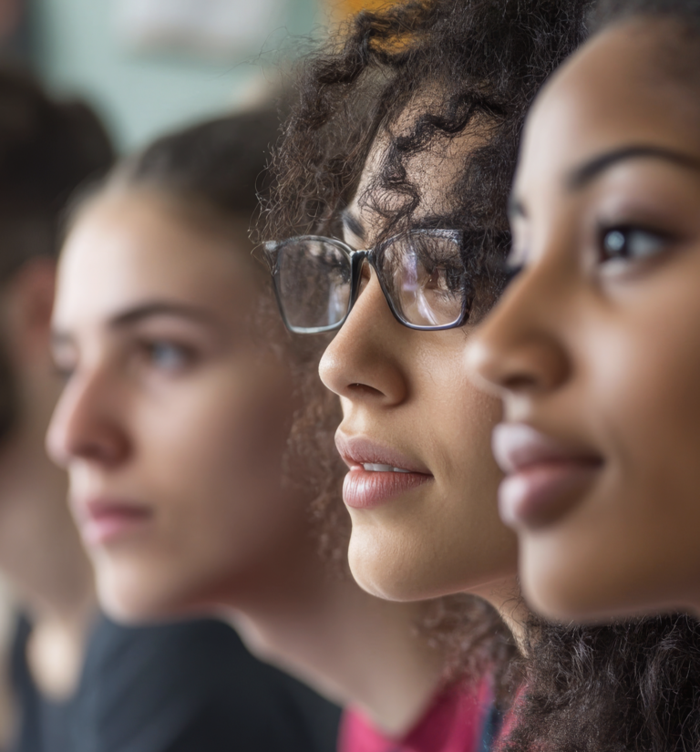 three women's faces in profile