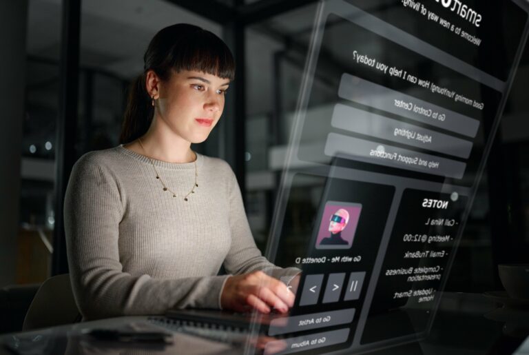 Woman at a computer with an illustration of content on a screen superimposed.